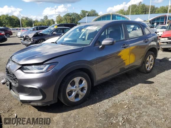 2023 Honda HR-V LX with VIN 3CZRZ2H32PM721882, listed as a Copart auction lot 82169025 with 77,864 mi miles and Clean title. Bid and sale history available at DreamBid. Image 1.