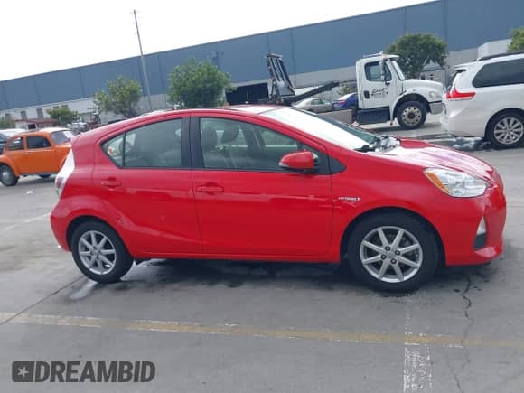 2012 Toyota Prius Four z VIN JTDKDTB37C1514044, wystawiony jako IAAI lot #43461297 z przebiegiem 150 172 mil mil oraz . Historia ofert i sprzedaży dostępna na DreamBid. Obrazek 13.