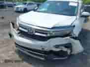 2020 Honda Pilot Touring 7-Passenger z VIN 5FNYF5H69LB000835, wystawiony jako IAAI lot #42318516 z przebiegiem 122 572 mil mil oraz . Historia ofert i sprzedaży dostępna na DreamBid. Obrazek 6.