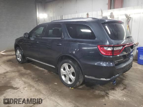 2014 Dodge Durango Limited with VIN 1C4SDJDTXEC332900, listed as a Copart auction lot 75940244 with 221,196 mi miles and Salvage title. Bid and sale history available at DreamBid. Image 2.