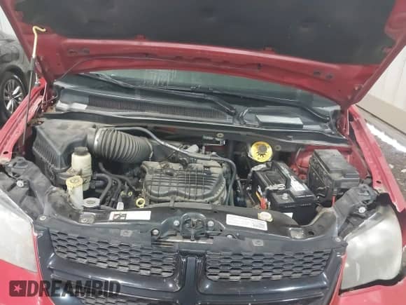 2014 Dodge Grand Caravan SE with VIN 2C4RDGBG3ER466291, listed as a IAAI auction lot 42801240 with 117,546 mi miles and . Bid and sale history available at DreamBid. Image 10.