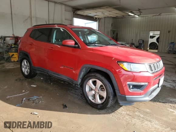 2019 Jeep Compass Altitude with VIN 3C4NJCBB2KT616176, listed as a Copart auction lot 80668455 with 73,518 mi miles and Salvage title. Bid and sale history available at DreamBid. Image 4.