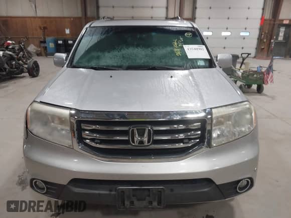 2012 Honda Pilot Touring with VIN 5FNYF4H90CB034523, listed as a IAAI auction lot 43540902 with 269,702 mi miles and . Bid and sale history available at DreamBid. Image 12.