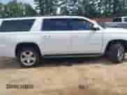 2015 Chevrolet Suburban LT z VIN 1GNSCJKC4FR298108, wystawiony jako IAAI lot #42649373 z przebiegiem 150 155 mil mil oraz . Historia ofert i sprzedaży dostępna na DreamBid. Obrazek 14.