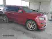 2012 Jeep Grand Cherokee SRT-8 z VIN 1C4RJFDJ9CC297461, wystawiony jako Copart lot #69259795 z przebiegiem Nie podano mil oraz Czysty tytuł • Clean title. Historia ofert i sprzedaży dostępna na DreamBid. Obrazek 4.