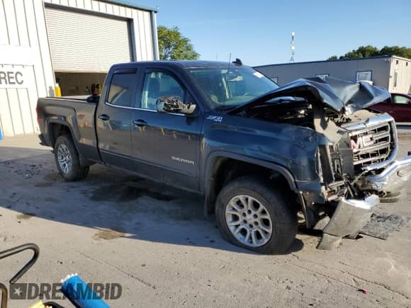 2017 GMC Sierra 1500 SLE with VIN 1GTV2MEC4HZ244560, listed as a Copart auction lot 84602495 with 85,283 mi miles and Salvage title. Bid and sale history available at DreamBid. Image 4.