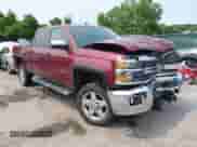 2015 Chevrolet Silverado 2500HD LT z VIN 1GC1KVE83FF102831, wystawiony jako IAAI lot #42411608 z przebiegiem 140 538 mil mil oraz . Historia ofert i sprzedaży dostępna na DreamBid. Obrazek 1.