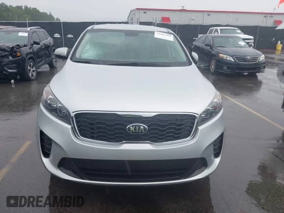 2019 Kia Sorento LX with VIN 5XYPG4A59KG497722, listed as a IAAI auction lot 42909959 with 58,704 mi miles and . Bid and sale history available at DreamBid. Image 12.