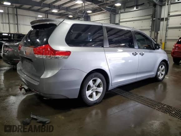 2012 Toyota Sienna with VIN 5TDZK3DC3CS240569, listed as a Copart auction lot 63664415 with 129,329 mi miles and Salvage title. Bid and sale history available at DreamBid. Image 3.
