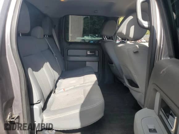 2013 Ford F-150 XLT с VIN 1FTFW1ET9DKG36203, выставлен на аукционе Copart как лот 84934275 с пробегом 186 341 миль миль и Списание • Salvage title. История ставок и продаж доступна на DreamBid. Изображение 10.