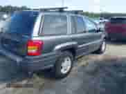 2003 Jeep Grand Cherokee Laredo z VIN 1J4GX48S63C578270, wystawiony jako IAAI lot #42656724 z przebiegiem 216 000 mil mil oraz . Historia ofert i sprzedaży dostępna na DreamBid. Obrazek 4.