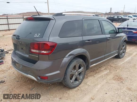 2017 Dodge Journey Crossroad with VIN 3C4PDCGG3HT537161, listed as a IAAI auction lot 41476568 with 141,396 mi miles and . Bid and sale history available at DreamBid. Image 4.