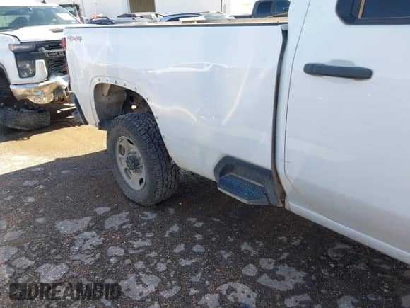 2023 Chevrolet Silverado 2500HD Work Truck with VIN 1GC1YLE75PF125815, listed as a IAAI auction lot 42818742 with 117,543 mi miles and . Bid and sale history available at DreamBid. Image 12.