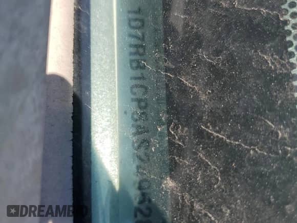 2010 Dodge 1500 TRX with VIN 1D7RB1CP8AS249528, listed as a Copart auction lot 71016725 with 167,764 mi miles and Salvage title. Bid and sale history available at DreamBid. Image 12.