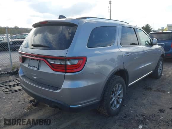 2018 Dodge Durango SXT with VIN 1C4RDJAG5JC176264, listed as a IAAI auction lot 43283972 with 141,830 mi miles and . Bid and sale history available at DreamBid. Image 4.