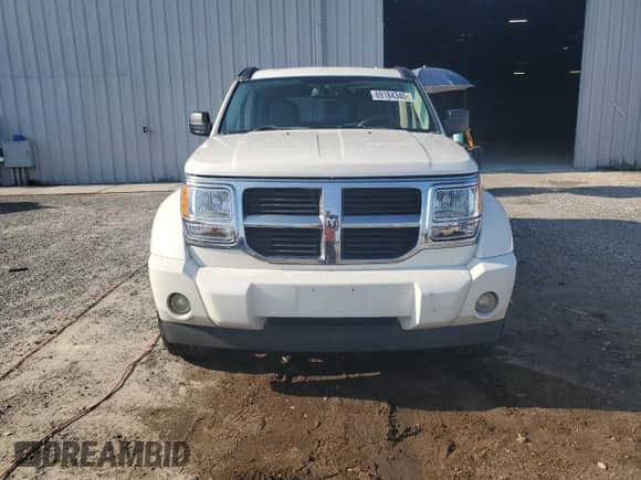 2007 Dodge Nitro SLT with VIN 1D8GU58K47W735000, listed as a Copart auction lot 69184345 with 157,753 mi miles and Salvage title. Bid and sale history available at DreamBid. Image 5.