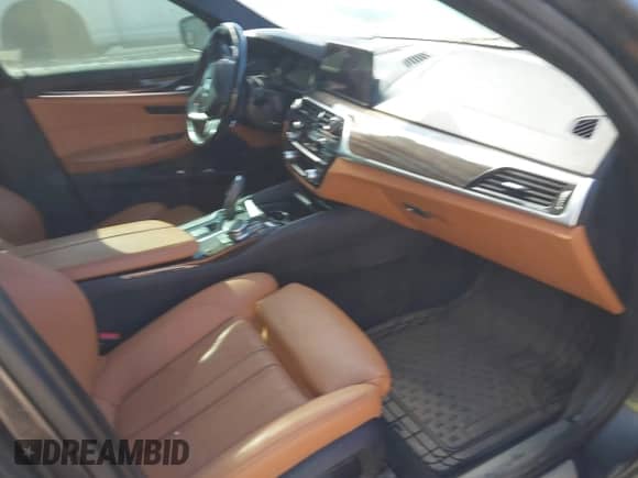 2017 BMW 5 Series 530i xDrive with VIN WBAJA7C34HWA69993, listed as a IAAI auction lot 41627056 with 61,068 mi miles and . Bid and sale history available at DreamBid. Image 5.