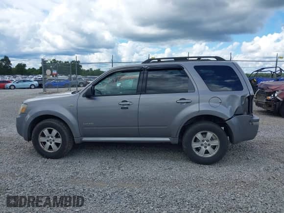 2008 Mercury Mariner with VIN 4M2CU91178KJ14388, listed as a IAAI auction lot 42973382 with 219,954 mi miles and . Bid and sale history available at DreamBid. Image 14.