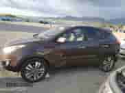 2014 Hyundai Tucson Limited with VIN KM8JUCAG7EU920239, listed as a Copart auction lot 84440335 with 136,646 mi miles and Salvage title. Bid and sale history available at DreamBid. Image 1.