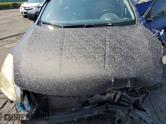 2010 Nissan Rogue S with VIN JN8AS5MV7AW114422, listed as a Copart auction lot 71532215 with 107,164 mi miles and Salvage title. Bid and sale history available at DreamBid. Image 12.