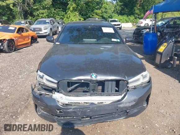 2021 BMW 5 Series 530i xDrive with VIN WBA13BJ03MWX21760, listed as a IAAI auction lot 42833981 with 77,077 mi miles and . Bid and sale history available at DreamBid. Image 12.