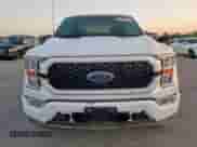2021 Ford F-150 XL z VIN 1FTEW1C89MKE55077, wystawiony jako Copart lot #51331265 z przebiegiem 32 936 mil mil oraz Szkoda całkowita • Salvage title. Historia ofert i sprzedaży dostępna na DreamBid. Obrazek 5.