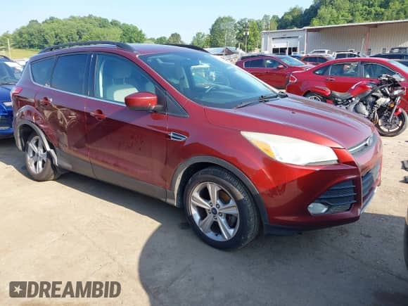 2014 Ford Escape SE z VIN 1FMCU0GX7EUD76372, wystawiony jako IAAI lot #42563457 z przebiegiem 134 777 mil mil oraz . Historia ofert i sprzedaży dostępna na DreamBid. Obrazek 1.