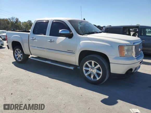 2012 GMC Sierra 1500 Denali with VIN 3GTP1XE2XCG236069, listed as a Copart auction lot 76631704 with 216,877 mi miles and Salvage title. Bid and sale history available at DreamBid. Image 4.