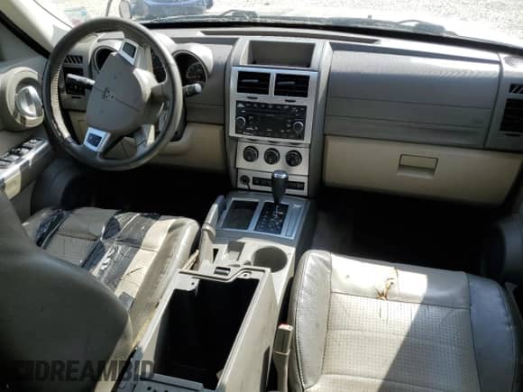 2007 Dodge Nitro SLT с VIN 1D8GT58KX7W619478, выставлен на аукционе Copart как лот 77249774 с пробегом Не указан миль и Списание • Salvage title. История ставок и продаж доступна на DreamBid. Изображение 8.