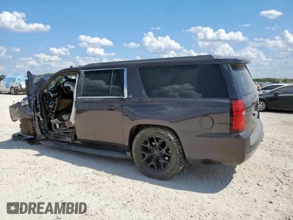 2015 Chevrolet Suburban LT with VIN 1GNSKJKC3FR232815, listed as a Copart auction lot 68625255 with Not provided miles and Non repairable. Bid and sale history available at DreamBid. Image 2.