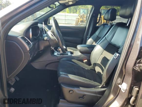 2020 Jeep Grand Cherokee Laredo E with VIN 1C4RJEAG9LC318229, listed as a Copart auction lot 70350665 with 154,160 mi miles and Salvage title. Bid and sale history available at DreamBid. Image 7.
