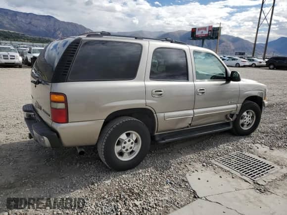 2001 Chevrolet Tahoe LT with VIN 1GNEK13T21J246434, listed as a Copart auction lot 85704855 with 230,449 mi miles and Salvage title. Bid and sale history available at DreamBid. Image 3.