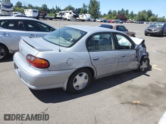 2000 Chevrolet Malibu LS с VIN 1G1NE52J7Y6206248, выставлен на аукционе Copart как лот 63652555 с пробегом Не указан миль и Списание • Salvage title. История ставок и продаж доступна на DreamBid. Изображение 3.