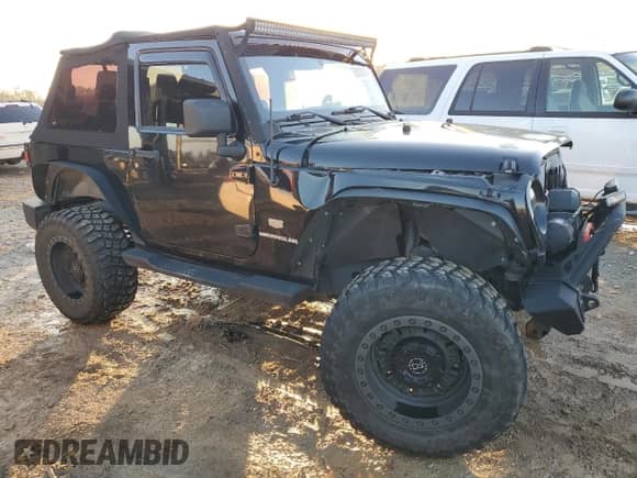 2011 Jeep Wrangler с VIN 1J4AA7D16BL604628, выставлен на аукционе Copart как лот 85826884 с пробегом 119 393 миль миль и Списание • Salvage title. История ставок и продаж доступна на DreamBid. Изображение 4.