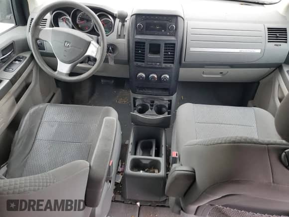 2010 Dodge Grand Caravan SE with VIN 2D4RN4DE9AR443389, listed as a Copart auction lot 57223315 with 379,870 mi miles and Salvage title. Bid and sale history available at DreamBid. Image 8.