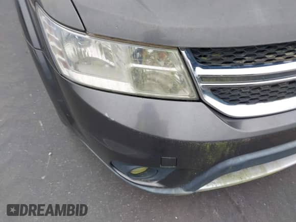 2014 Dodge Journey SXT with VIN 3C4PDDBG6ET141105, listed as a IAAI auction lot 43443646 with 164,188 mi miles and . Bid and sale history available at DreamBid. Image 16.