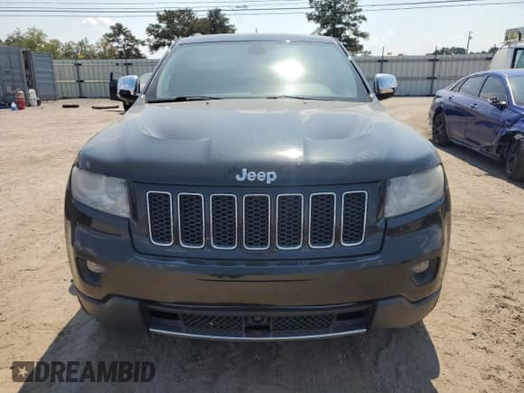 2012 Jeep Grand Cherokee Overland with VIN 1C4RJECG4CC354505, listed as a Copart auction lot 81052135 with 126,523 mi miles and Salvage title. Bid and sale history available at DreamBid. Image 5.