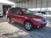 2010 Hyundai Santa Fe Limited with VIN 5NMSK4AG0AH355774, listed as a Copart auction lot 52248935 with 251,385 mi miles and Salvage title. Bid and sale history available at DreamBid. Image 4.