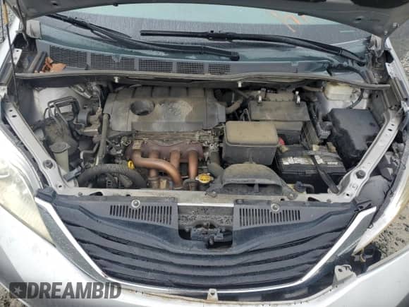 2011 Toyota Sienna с VIN 5TDKA3DC4BS007125, выставлен на аукционе Copart как лот 66896705 с пробегом Не указан миль и Списание • Salvage title. История ставок и продаж доступна на DreamBid. Изображение 12.