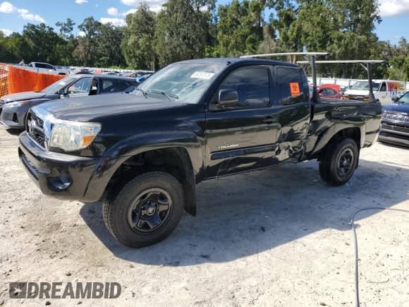 2011 Toyota Tacoma PreRunner with VIN 5TFTX4GNXBX004892, listed as a Copart auction lot 86297375 with 125,353 mi miles and Salvage title. Bid and sale history available at DreamBid. Image 1.