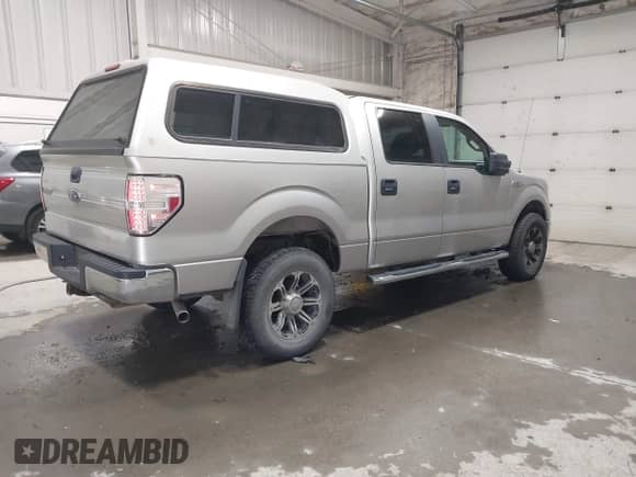 2010 Ford F-150 XL with VIN 1FTEW1E8XAFC11181, listed as a IAAI auction lot 42500302 with 93,105 mi miles and . Bid and sale history available at DreamBid. Image 4.
