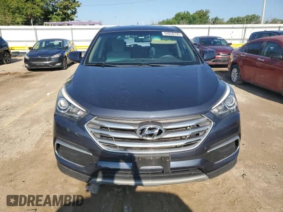 2018 Hyundai Santa Fe 2.4L с VIN 5NMZTDLB9JH095100, выставлен на аукционе Copart как лот 64850795 с пробегом 92 794 миль миль и Списание • Salvage title. История ставок и продаж доступна на DreamBid. Изображение 5.