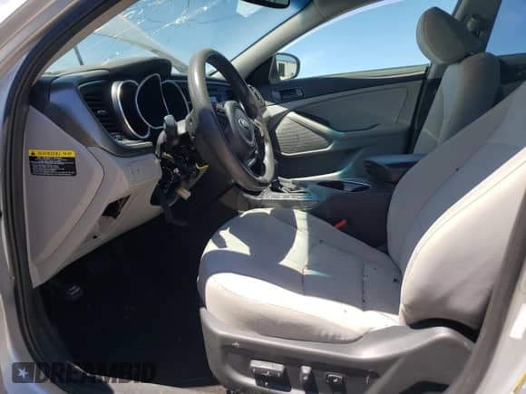 2014 Kia Optima LX с VIN 5XXGM4A71EG286307, выставлен на аукционе Copart как лот 58336974 с пробегом Не указан миль и Списание • Salvage title. История ставок и продаж доступна на DreamBid. Изображение 7.