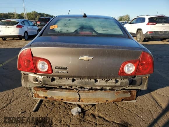 2012 Chevrolet Malibu 1LS z VIN 1G1ZB5E05CF229095, wystawiony jako Copart lot #85526685 z przebiegiem Nie podano mil oraz Czysty tytuł • Clean title. Historia ofert i sprzedaży dostępna na DreamBid. Obrazek 6.