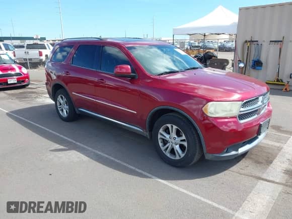 2013 Dodge Durango SXT with VIN 1C4RDHAG7DC685771, listed as a IAAI auction lot 43464816 with 149,141 mi miles and . Bid and sale history available at DreamBid. Image 1.