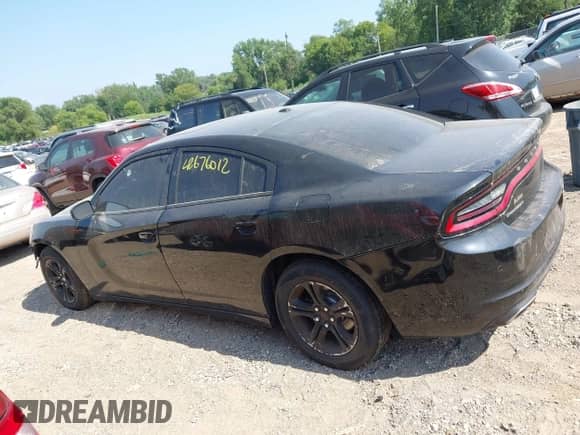 2019 Dodge Charger SXT with VIN 2C3CDXBG6KH636333, listed as a IAAI auction lot 42676012 with 118,897 mi miles and . Bid and sale history available at DreamBid. Image 14.