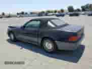 1992 Mercedes-Benz 500 z VIN WDBFA66E0NF040854, wystawiony jako Copart lot #63866875 z przebiegiem 144 606 mil mil oraz Szkoda całkowita • Salvage title. Historia ofert i sprzedaży dostępna na DreamBid. Obrazek 2.