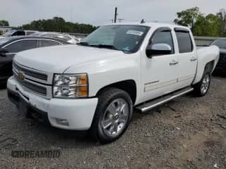 2012 Chevrolet Silverado 1500 LTZ with VIN 1GCPKTE71CF124456, listed as a Copart auction lot 83750495 with 158,377 mi miles and Salvage title. Bid and sale history available at DreamBid. Image 1.
