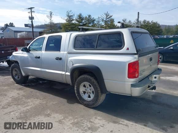 2008 Dodge Dakota SLT с VIN 1D7HW48NX8S507566, выставлен на аукционе IAAI как лот 41373343 с пробегом 77 674 миль миль и . История ставок и продаж доступна на DreamBid. Изображение 3.