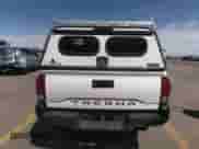 2018 Toyota Tacoma SR с VIN 5TFRX5GN7JX105158, выставлен на аукционе IAAI как лот 41897876 с пробегом 209 099 миль миль и . История ставок и продаж доступна на DreamBid. Изображение 16.